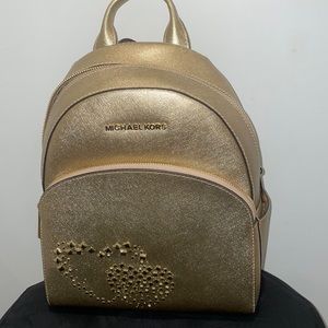 Gold midsize stylish backpack from Michael Kors, never used!